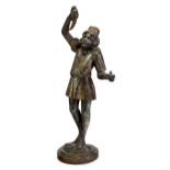 An Italian polychrome decorated figural torchere, late 18th century, the right hand holding aloft...