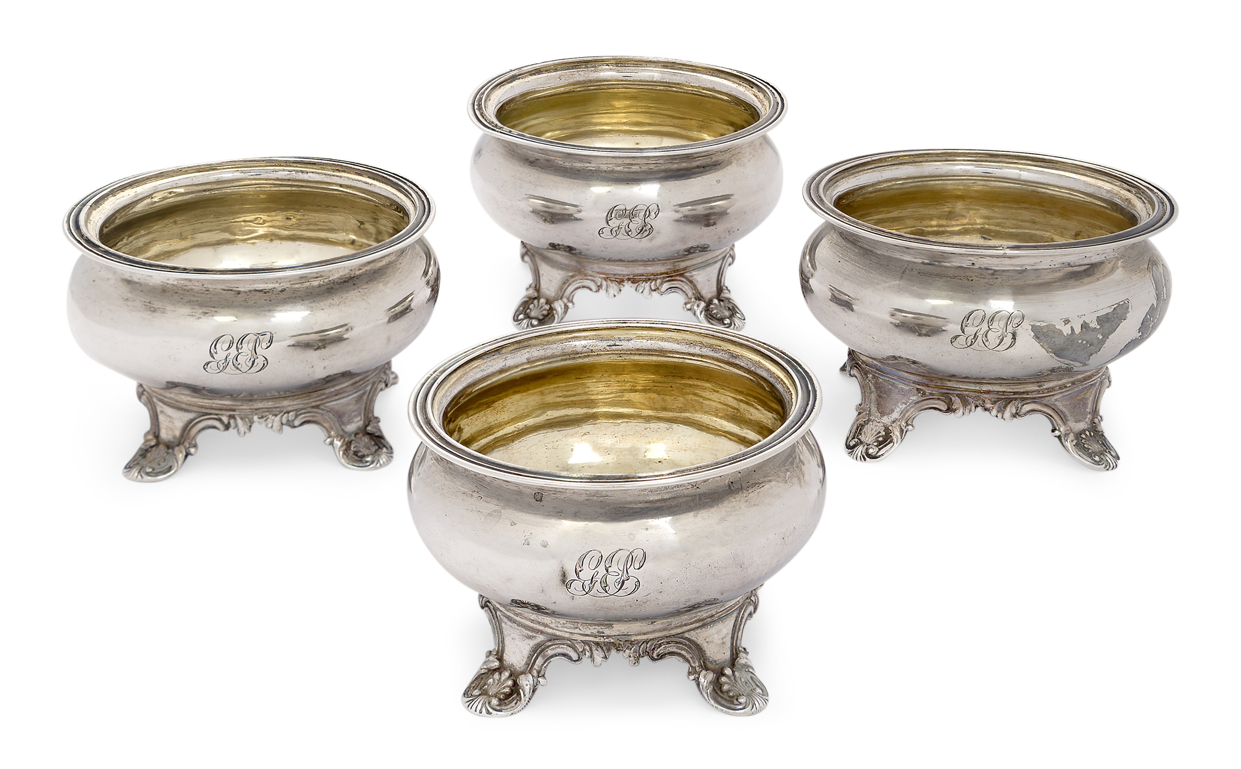 A set of four circular silver salts by Joseph & Albert Savory, London, 1837, raised on four shell...