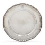 A George III silver dinner plate, London, 1783, William Pitts, of shaped circular form with gadro...