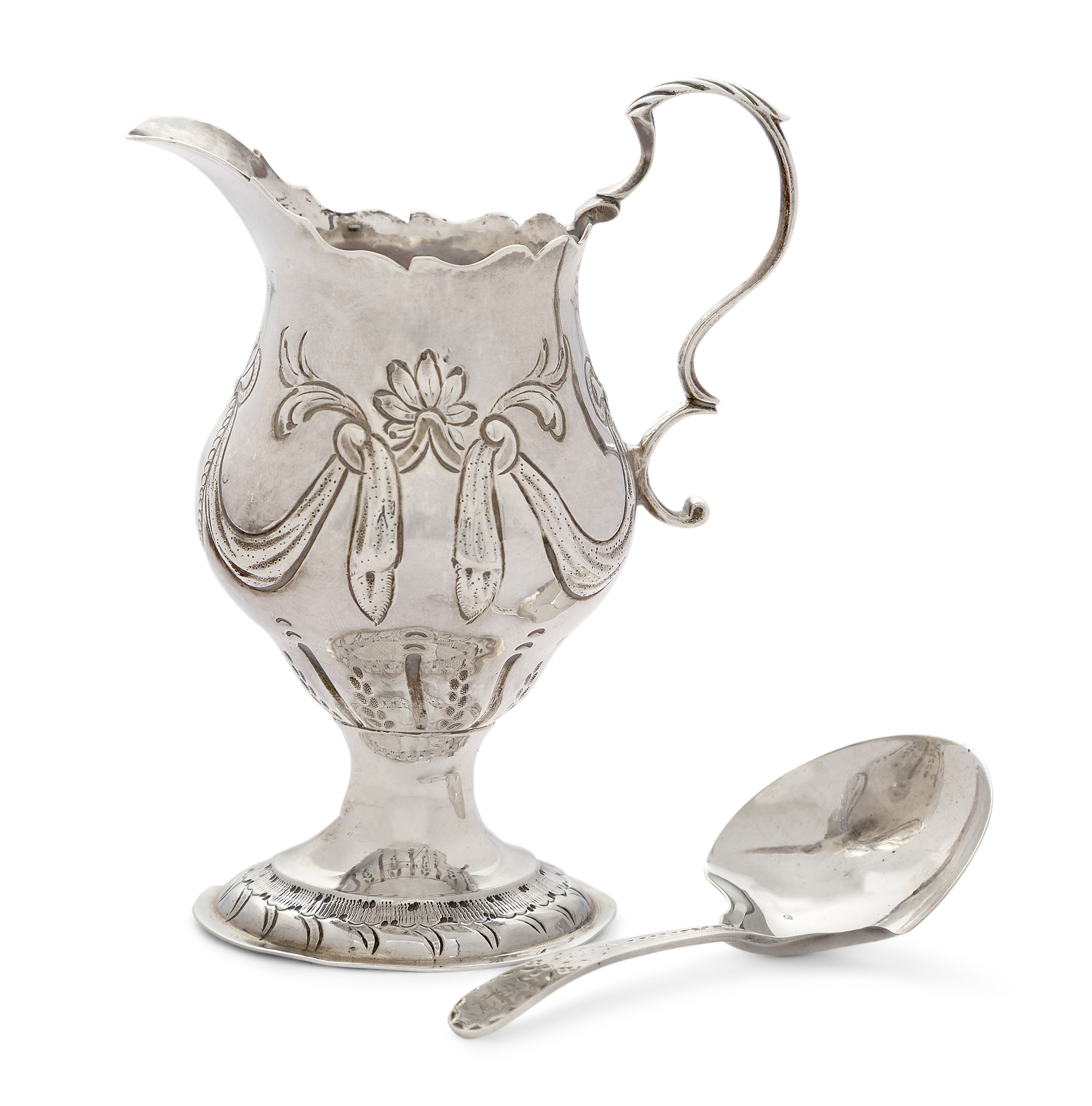 A George III silver cream jug, London, 1775, Ann Smith & Nathaniel Appleton, of baluster form wit...