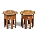 A pair of Damascus tables, first quarter 20th century, ebony and bone inlaid, 32cm high, 31cm wid...