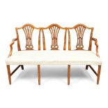 A late Victorian satinwood triple chair-back sofa, in the George III style, last quarter 19th cen...