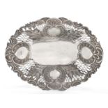 A pierced Victorian silver dish, London, 1892, Edward Hutton, of oval form with shaped scroll bor...