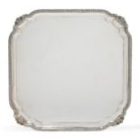 An Asprey & Co. silver salver, London, 1994, of shaped square form with applied gadroon and shell...