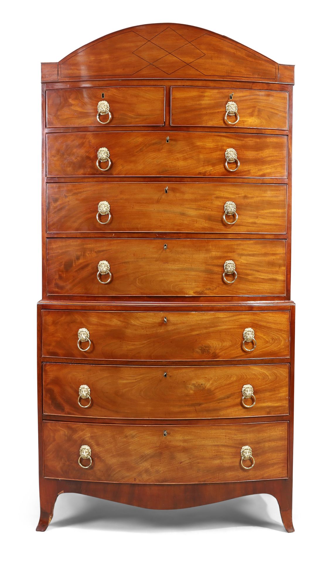 A Regency mahogany bow front chest on chest, first quarter 19th century, the shaped cornice ebony...