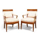 A pair of elm armchairs, possibly Austrian, 19th century, with curved arms, raised on square tape...