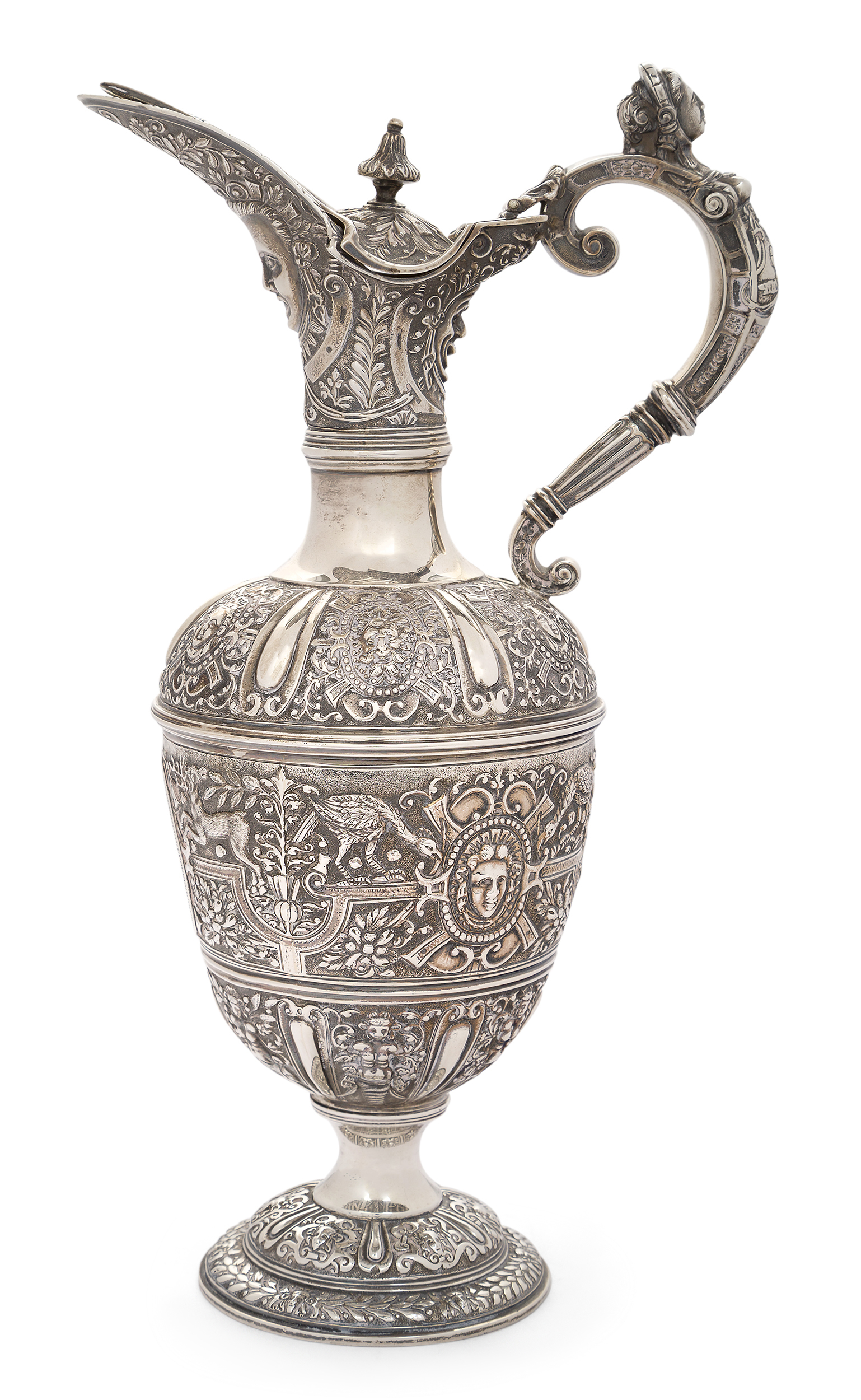 A Victorian silver 'Cellini' style ewer, London, 1883, Charles Boyton II, of ovoid form, the body...