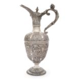 A Victorian silver 'Cellini' style ewer, London, 1883, Charles Boyton II, of ovoid form, the body...