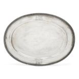 A large Regency silver meat platter, London, 1815,Thomas Robins, of oval form with gadrooned bord...