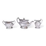 A Scottish silver three piece bachelor's tea set, Glasgow, 1904, George Edward & Sons, the oval r...