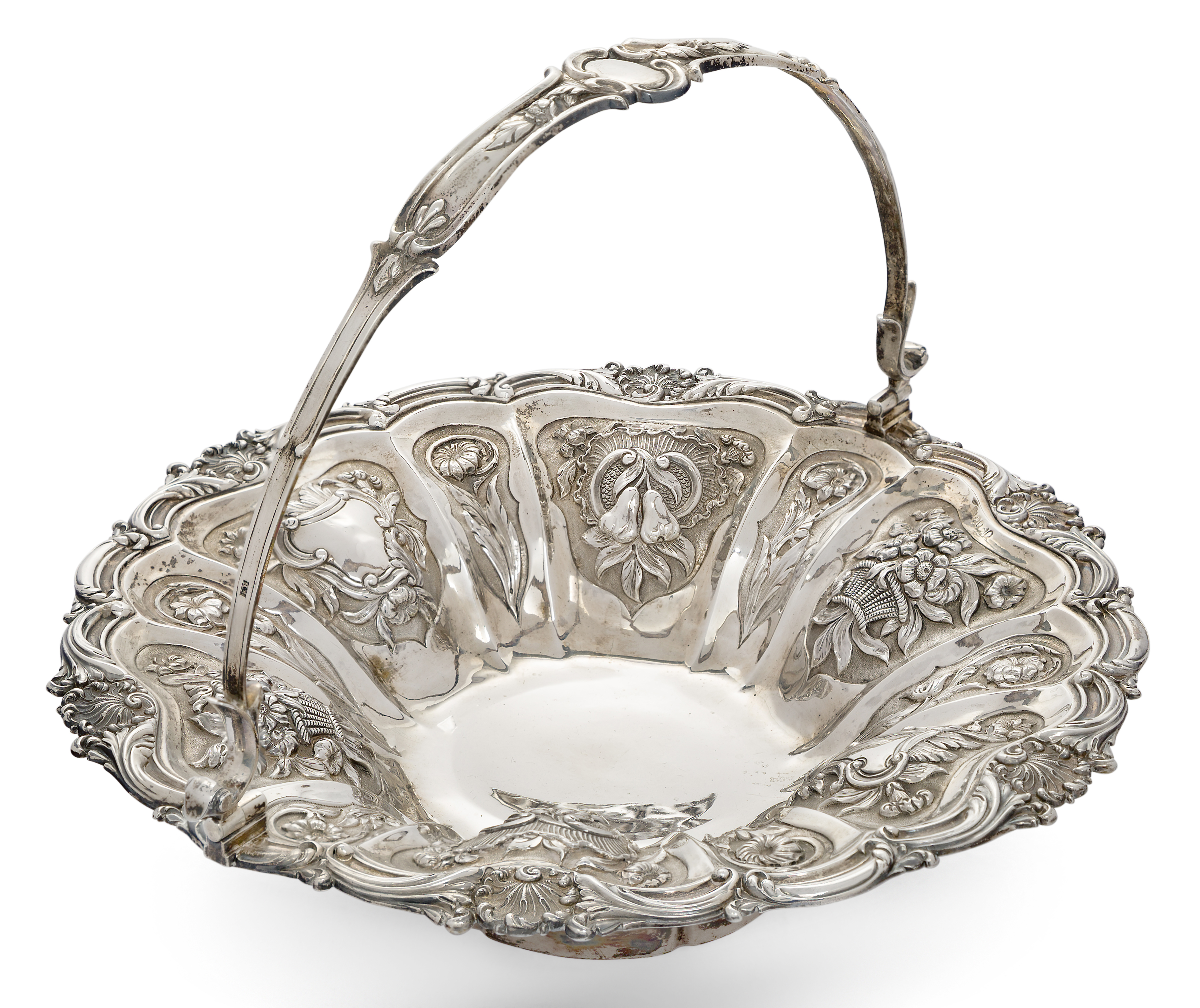 A William IV silver cake basket, London, 1836, Edward Barton, of circular form with swing handle ...