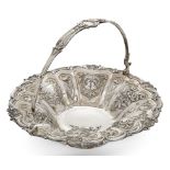 A William IV silver cake basket, London, 1836, Edward Barton, of circular form with swing handle ...