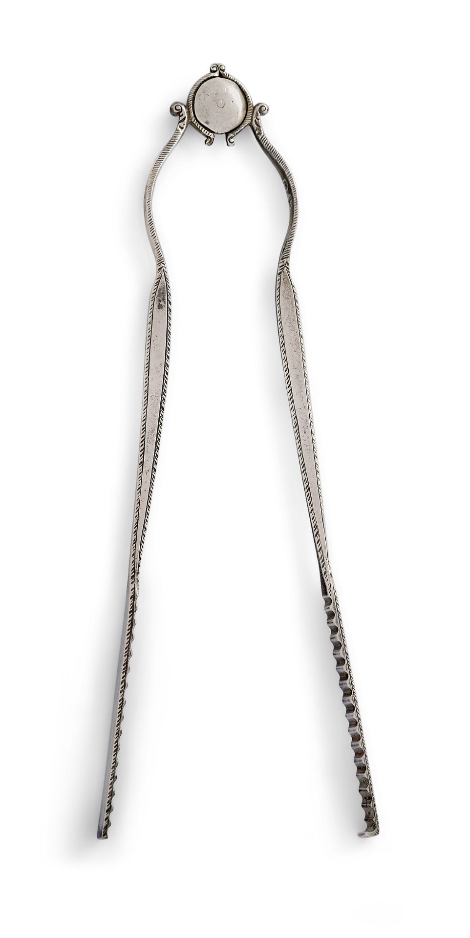 A pair of sprung silver serving tongs, c.1775, maker IB, with corrugated terminations and feather...