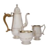 A three piece silver coffee set made by Bryan Savage for Padgett & Braham, hallmarked London, 196...