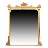 A large Victorian gilt wood and gesso over mantle mirror, second quarter 19th century, the scroll...