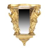 A Victorian giltwood and gesso mirror back wall bracket, second quarter 19th century, the shaped ...