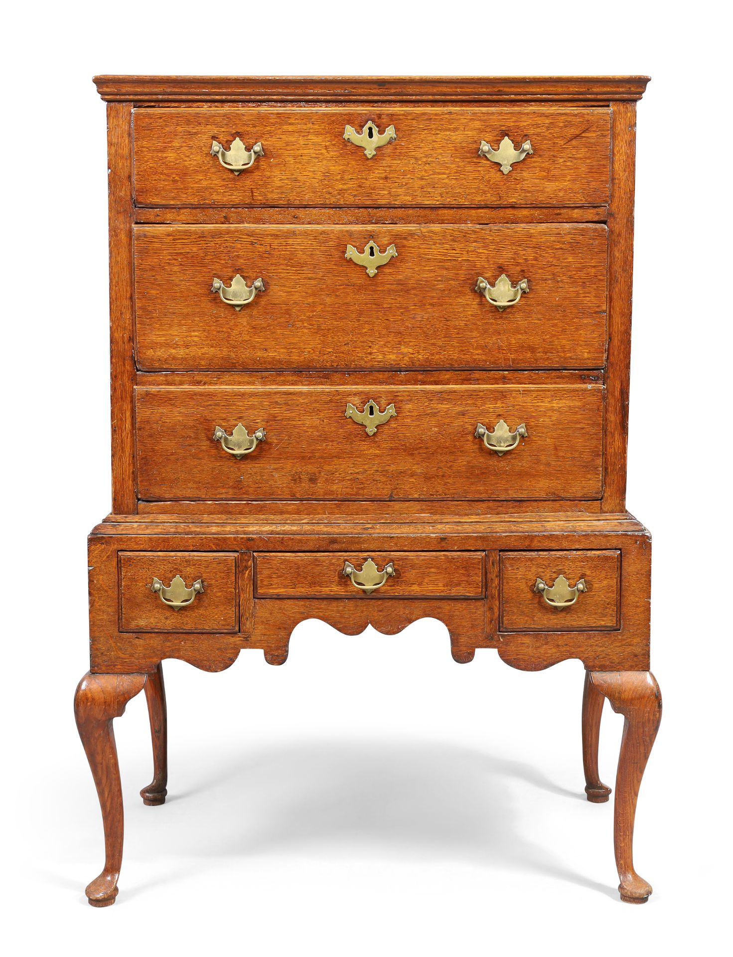 A George II oak chest on stand, third quarter 18th century, with three long above three short dra...
