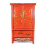A Chinese red lacquered wedding cabinet, second quarter 20th century, painted with warriors on ho...