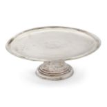 An early 18th century footed waiter, marks very rubbed, of circular form with moulded border and ...