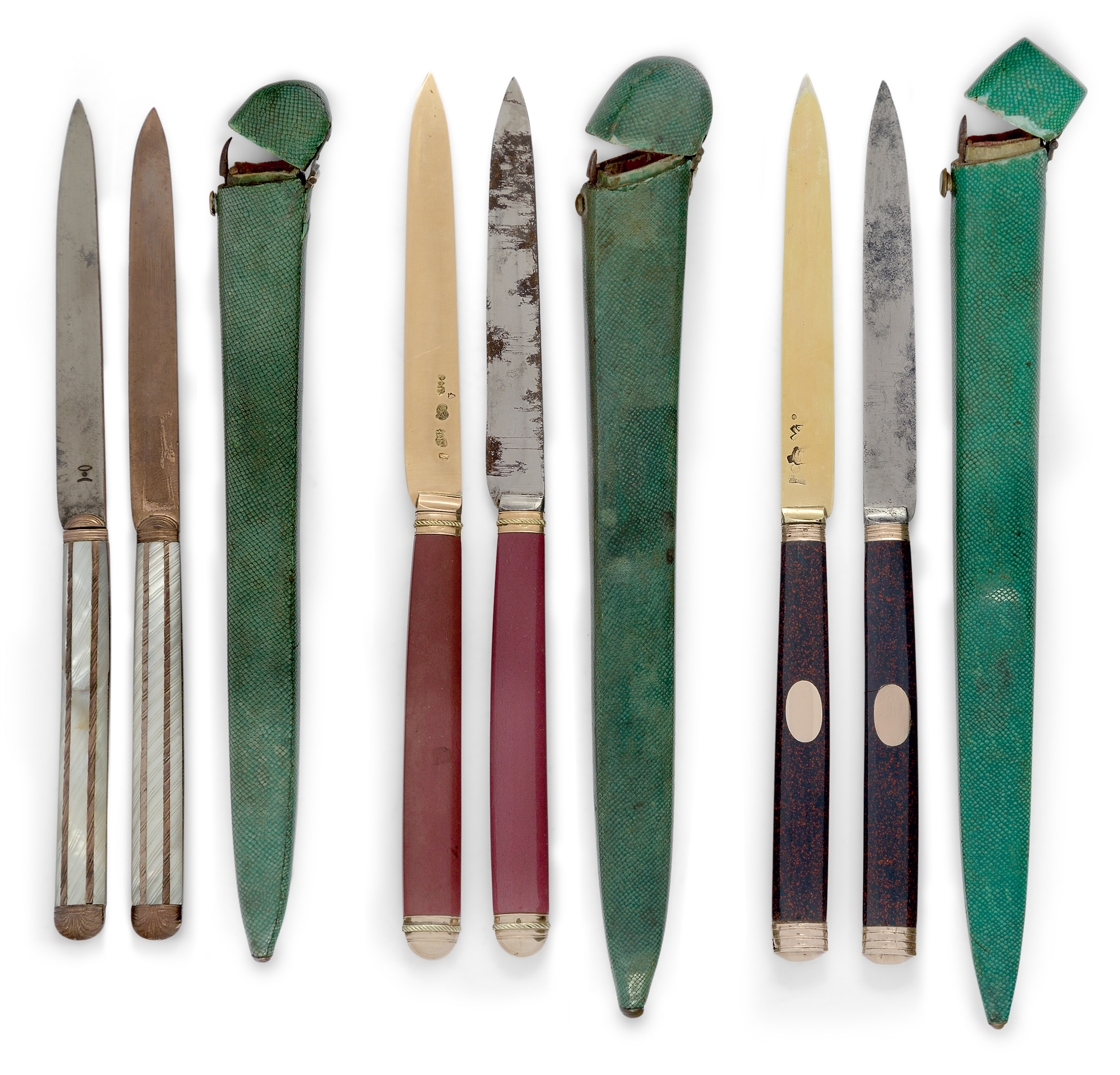 Three pairs of French travelling knives in fitted shagreen cases, comprising: an 18th century pai...