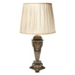 A French patinated and gilt-metal table lamp, of Empire style, second half 20th century, with app...