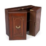 A Regency mahogany and camphor wood campaign medicine cabinet, first quarter 19th century, the tw...