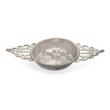 A George I silver lemon strainer, London, 1719, John Albright, with foliate pierced bowl to pierc...