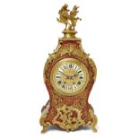 A French gilt-bronze mounted brass inlaid tortoiseshell bracket clock, in the manner of André-Cha...