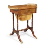 A Regency mahogany brass inlaid sewing table, first quarter 19th century, the top with brass gall...