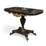 A Victorian papier mache and black lacquered side table, second quarter 19th century, the rounded...