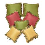 A group of seven various silk cushions, late 20th century, various colours and sizes, with tassel...