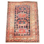 A Caucasian Shirvan rug, first quarter 20th century, the central field with four geometric medall...