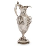 A French silver plated ewer, stamped E. Philippe, Paris, designed with mask of Neptune beneath th...