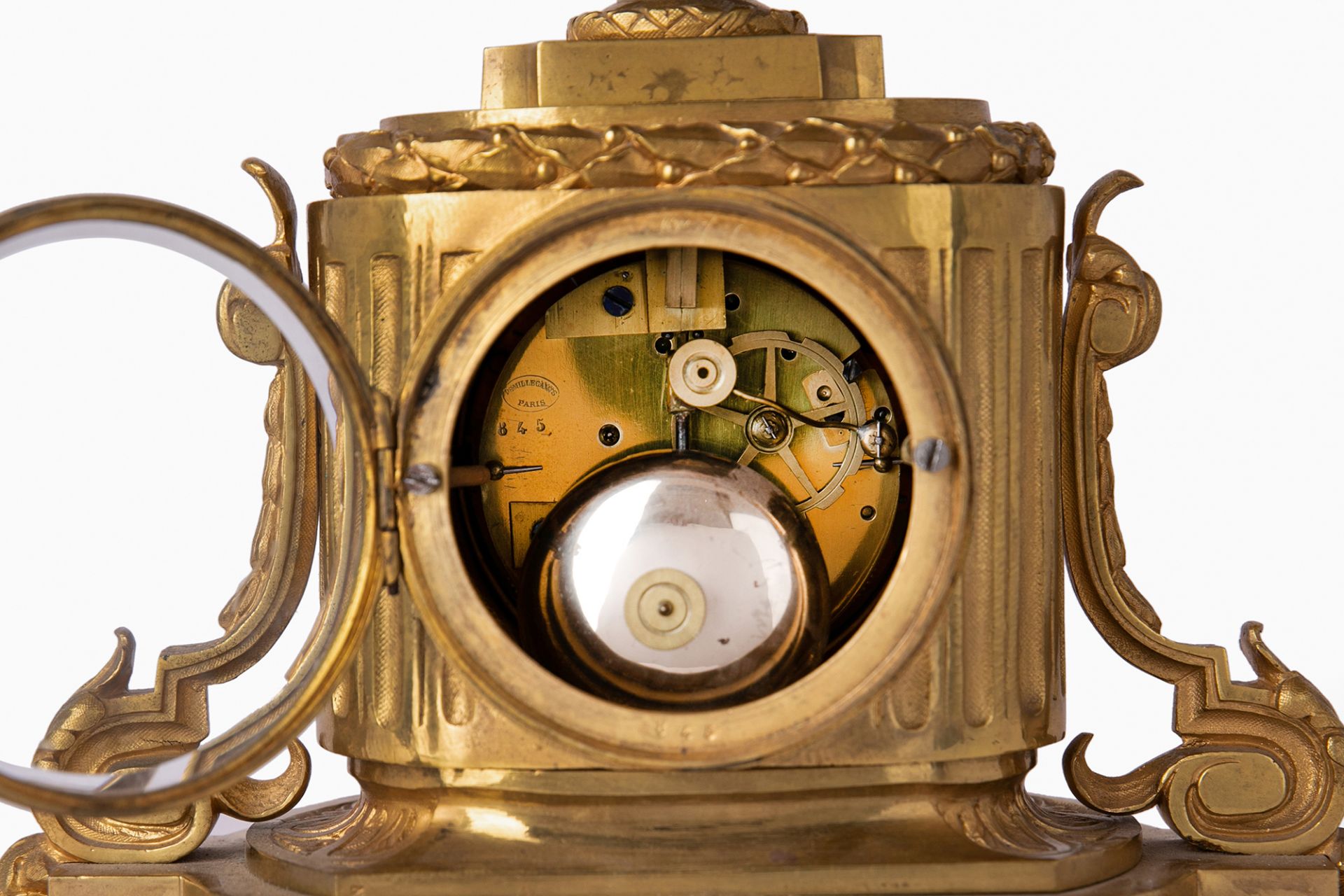 A French gilt-bronze mantel clock, mid-19th century, the case with truncated column flanked by sc... - Image 4 of 4