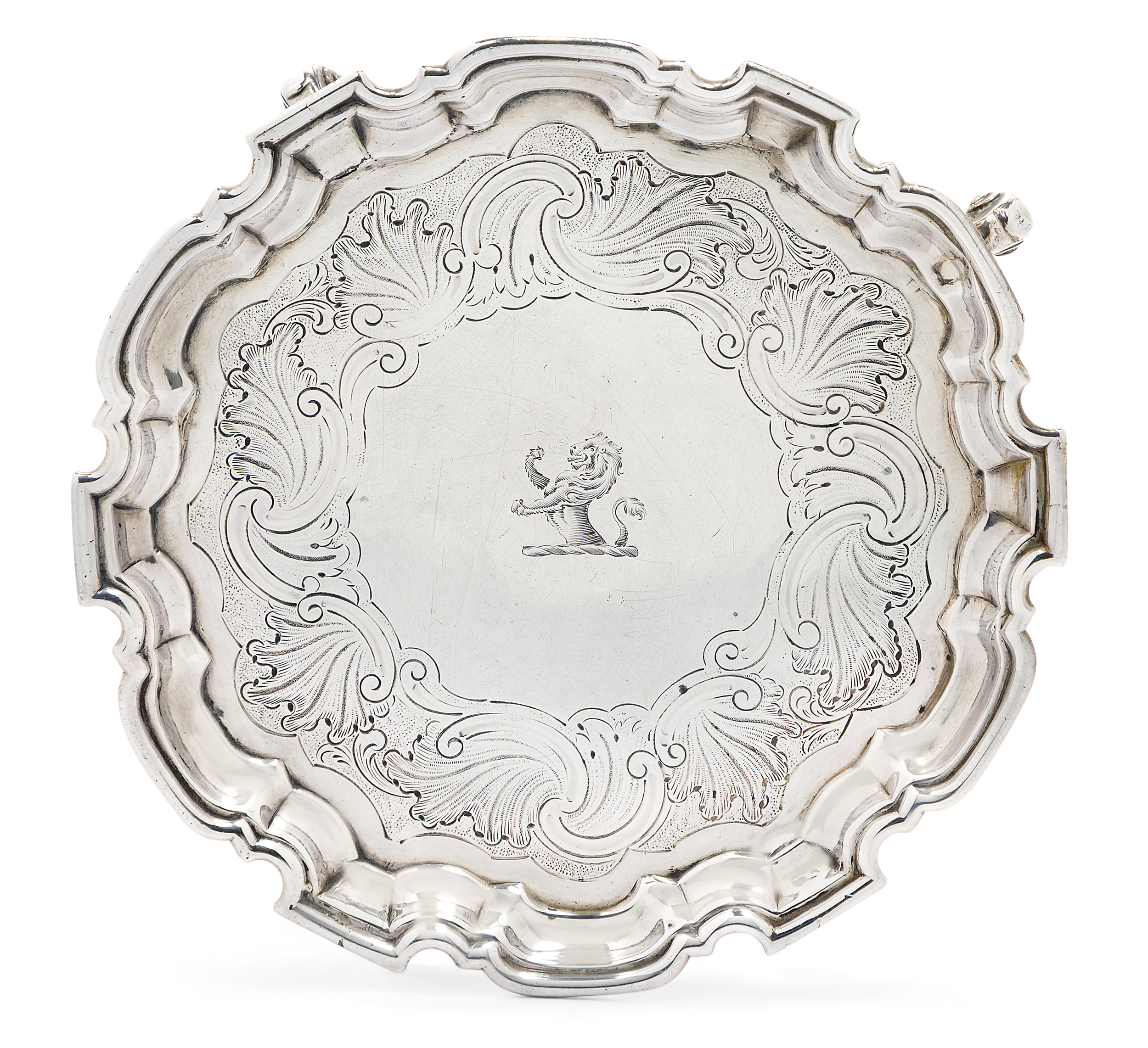 A George II silver waiter, London, 1732, probably John Tuite (mark indistinct), raised on four sc...