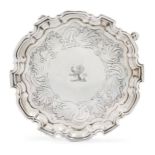 A George II silver waiter, London, 1732, probably John Tuite (mark indistinct), raised on four sc...