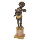 A large French bronze model of Cupid, 19th century, with gilt drapery, on a gilt-bronze mounted m...