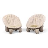 A pair of composition shell grotto chairs, late 20th century, raised on scrolling feet, 97cm high...