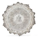 A George IV silver salver, London, 1827, J. E. Terrey & Co., with shaped shell and scroll border ...