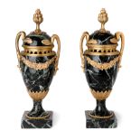 A pair of French gilt-bronze mounted verde antico marble urns, of Louis XVI style, late 19th cent...