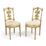A pair of French giltwood side chairs, Louis XVI style, last quarter 19th century, the carved bac...