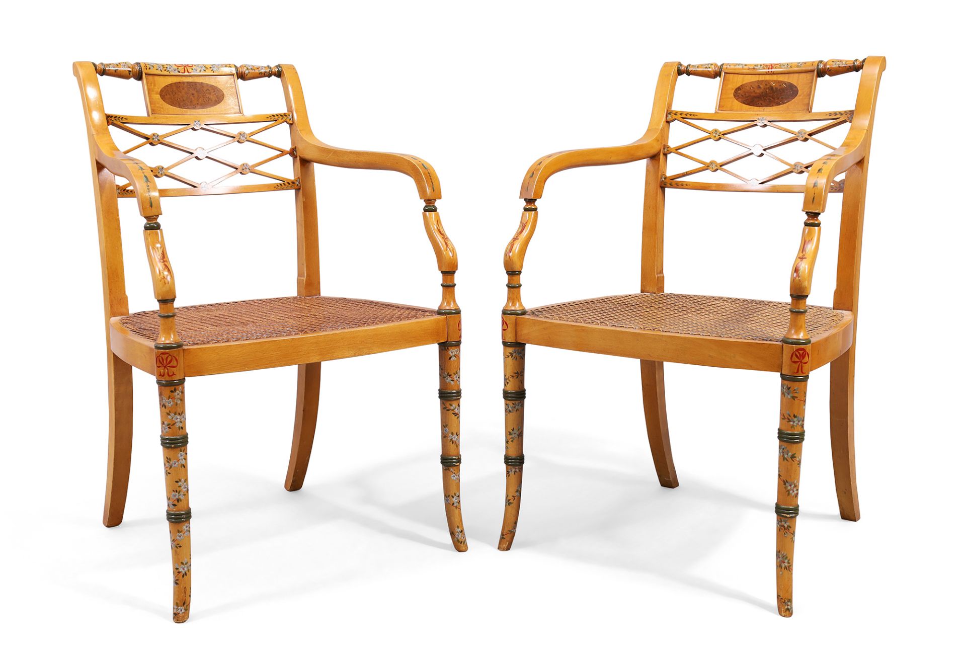 A pair of English inlaid satinwood armchairs, in Sheraton style, 20th century, polychrome painted...
