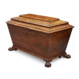 A Victorian mahogany cellarette of sarcophagus form, second quarter 19th century, the hinged lid ...