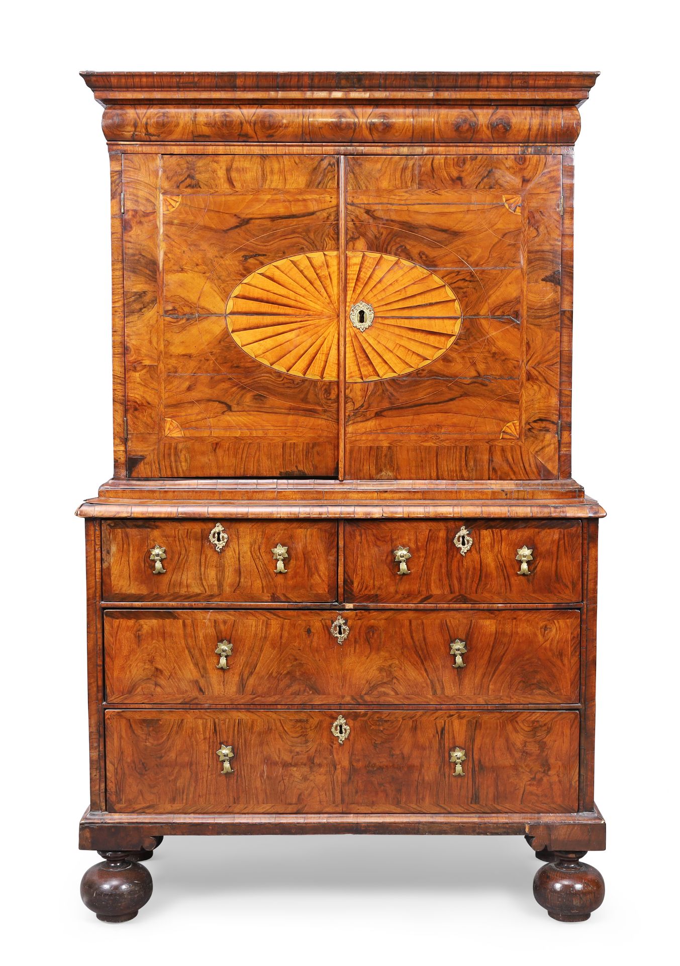 A Queen Anne walnut cabinet on chest, first quarter 18th century, the moulded cornice above cushi...