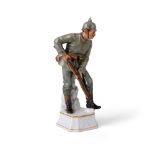 A Meissen porcelain figure of an Imperial German Infantryman, c.1914, blue crossed swords mark, m...