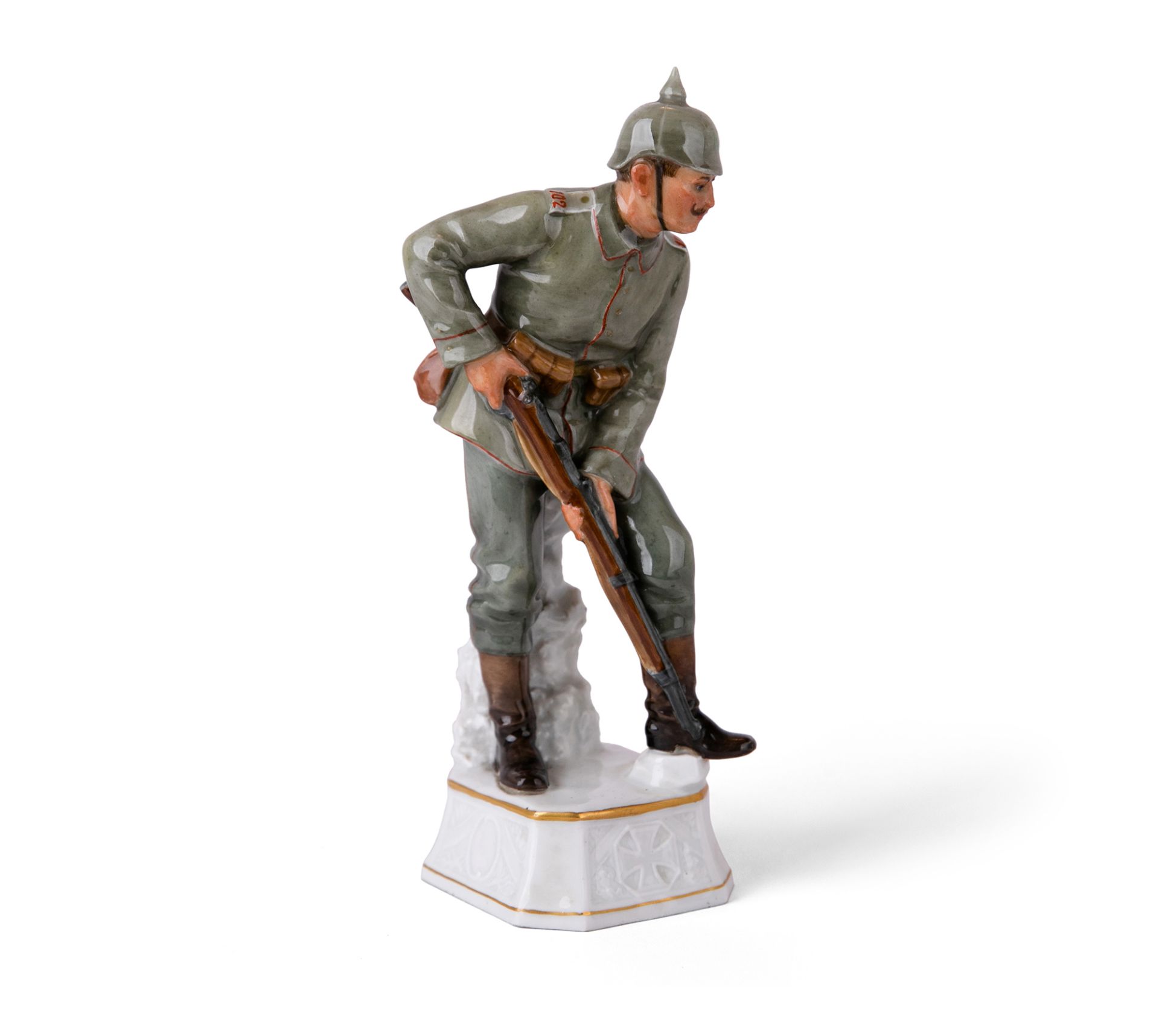 A Meissen porcelain figure of an Imperial German Infantryman, c.1914, blue crossed swords mark, m...