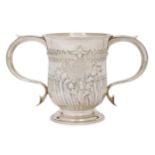 A George III silver twin handled cup, London, 1763, William Cripps, the half-fluted body with rep...
