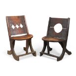 Two Ethiopian carved hardwood chairs, possibly by the Oromo people, 20th century, the pierced bac...