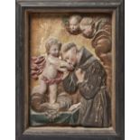 An Italian relief paper panel of Saint Anthony of Padua, late 19th century, with the Christ Child...