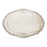 A George II silver meat platter, London, 1758, Charles Frederick Kandler, of shaped oval form wit...